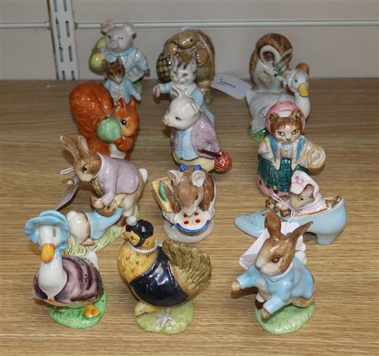 Fifteen Beswick Beatrix Potter figures, including The Old Woman Who Lived in a Shoe,